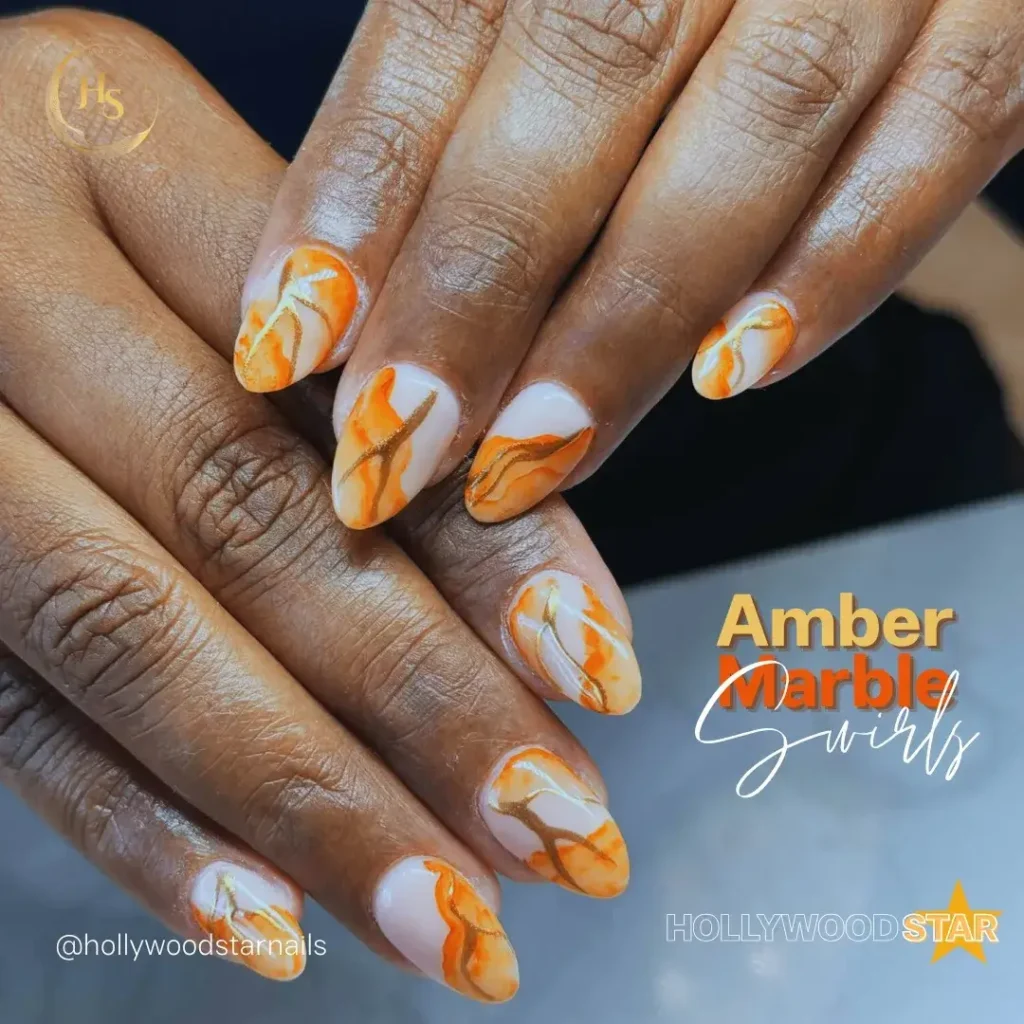Fall Nail Design Inspo and Colors 2026: Shades, Techniques, and Looks for Every Nail 48 amber marble fall nail ideas