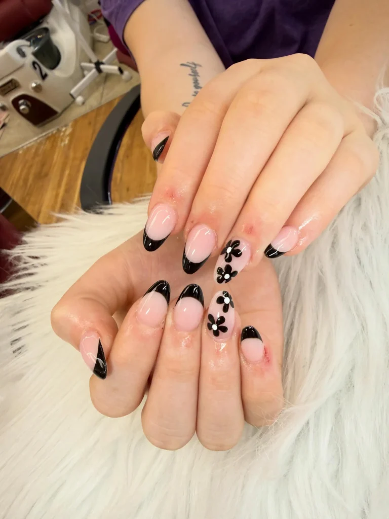 black french tip nails with flowers
