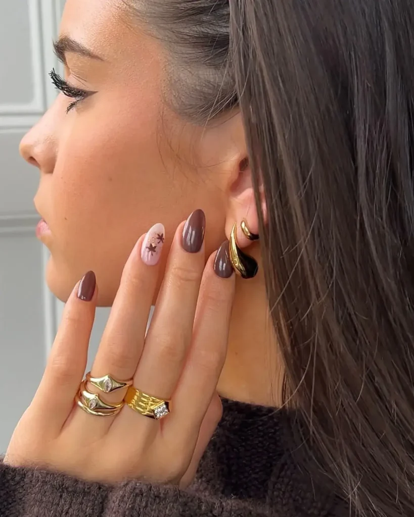 Fall Nail Design Inspo and Colors 2026: Shades, Techniques, and Looks for Every Nail 36 brown fall nail designs with a leaf accent