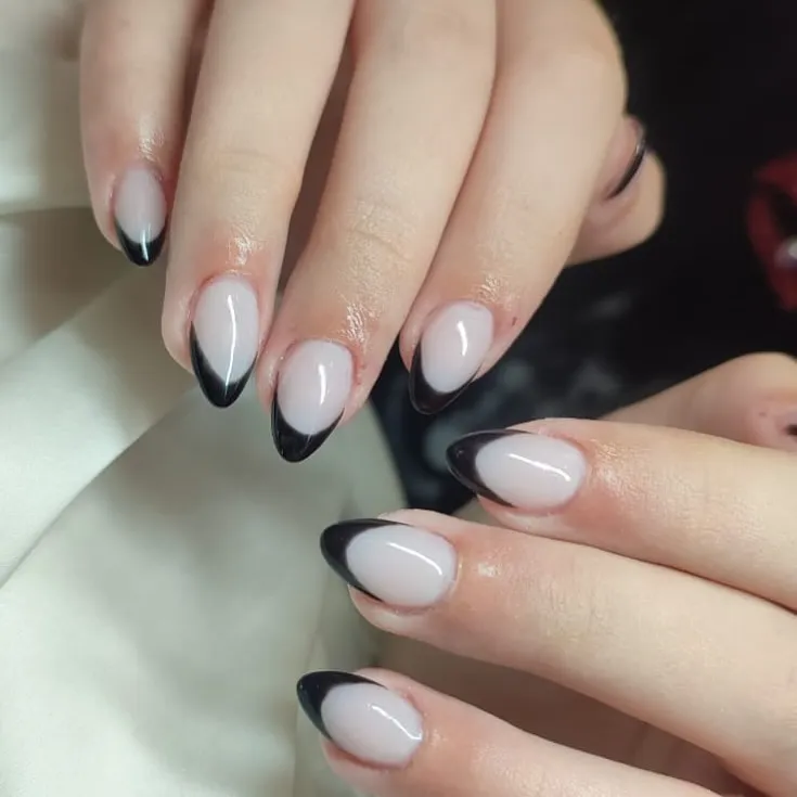 milky white nails with black french tip