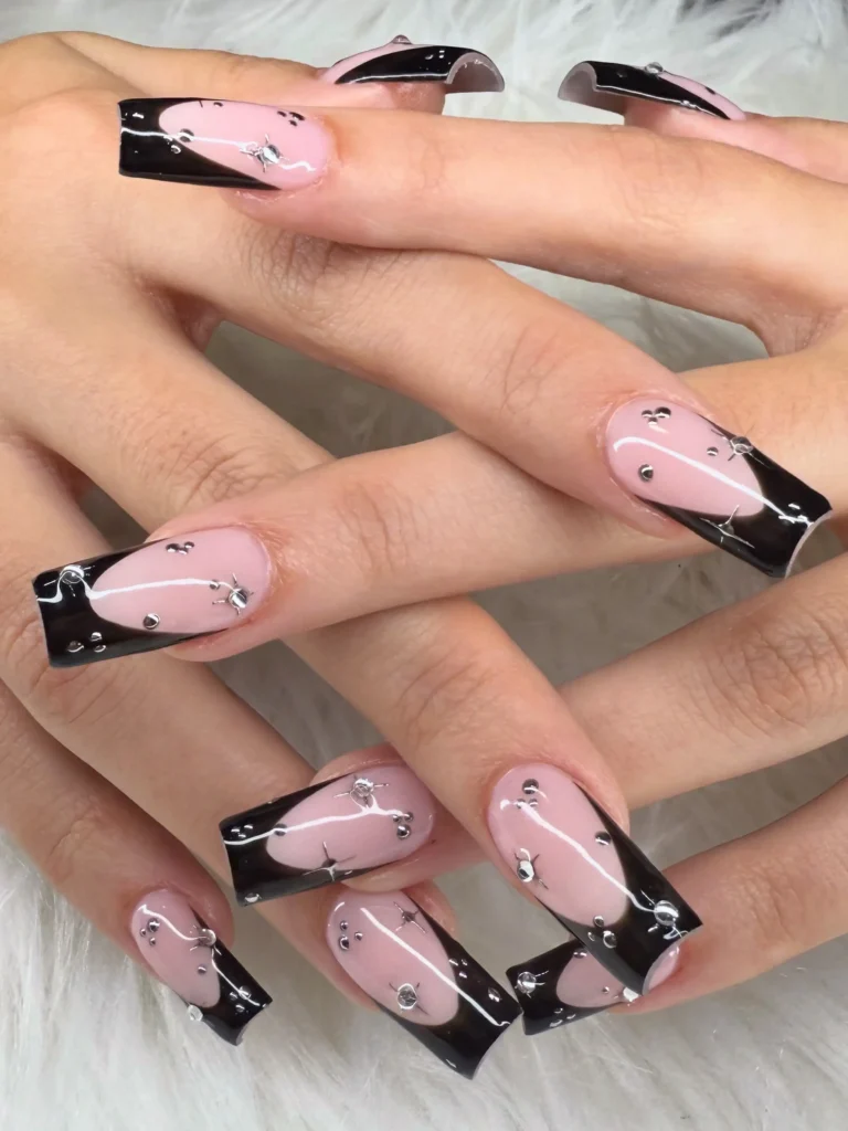 rhinestone and gem embellished black french tip nail designs