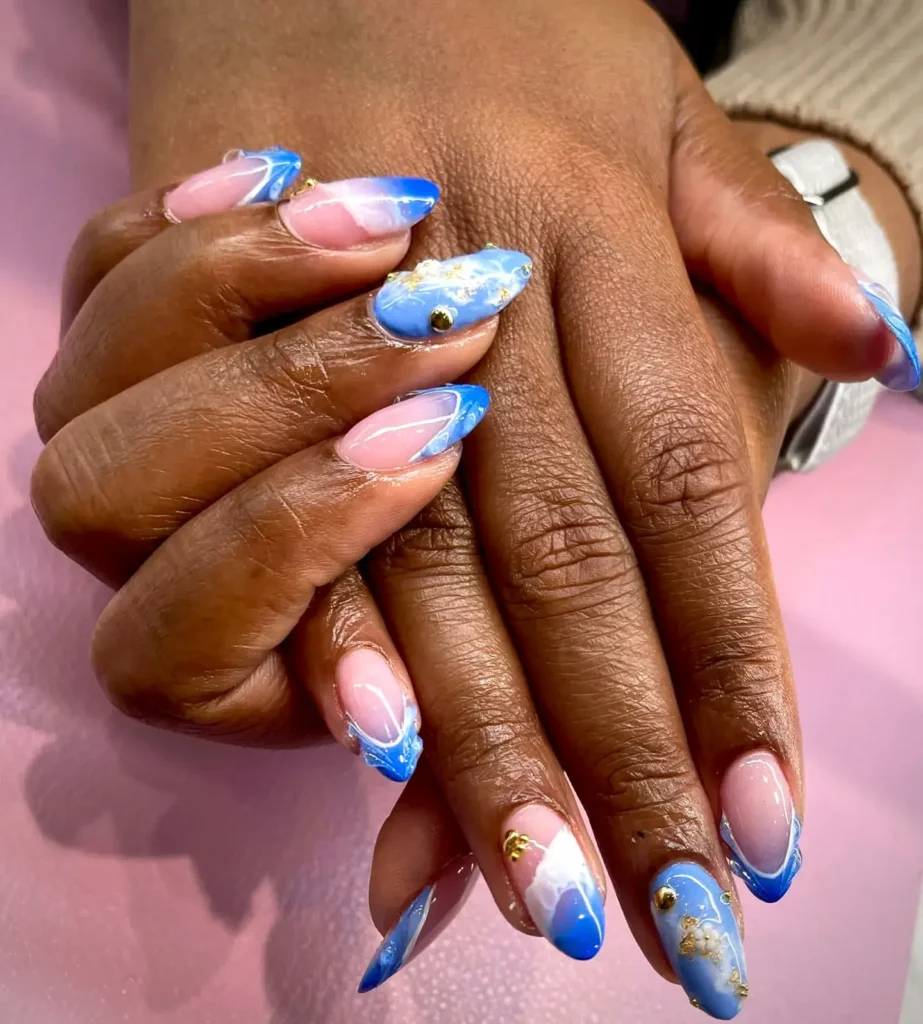 abstract swirls and marble blue finish french tip nails