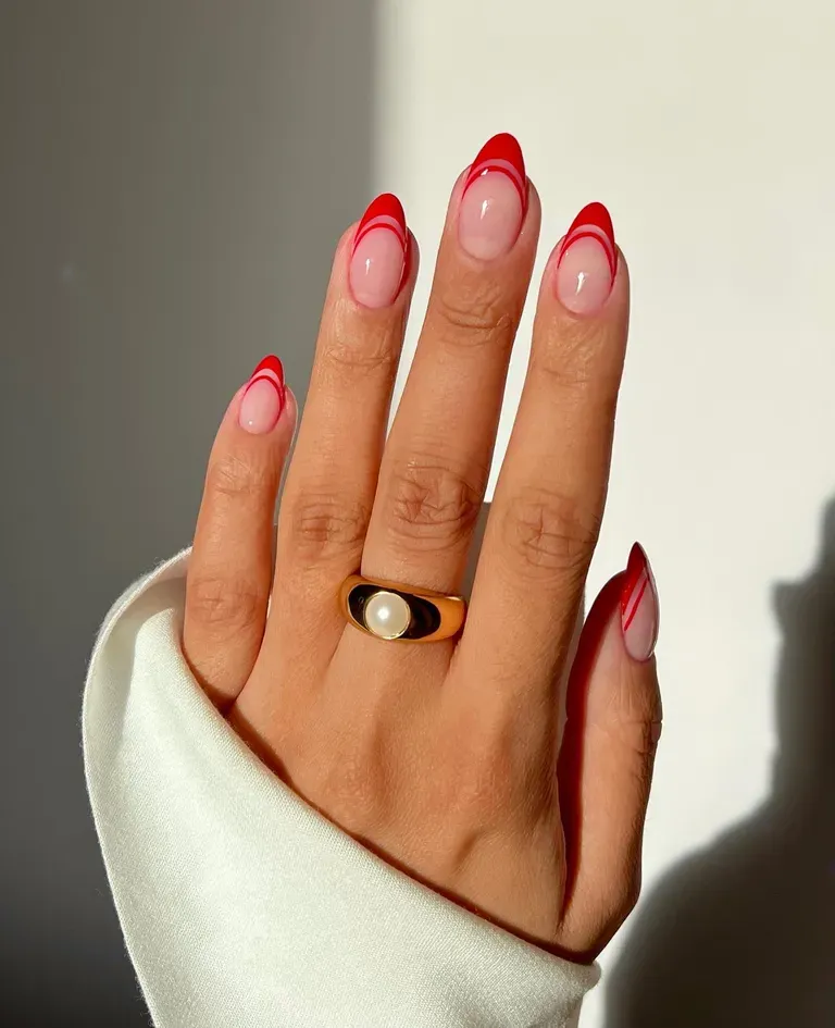 asymmetrical red french tip nails