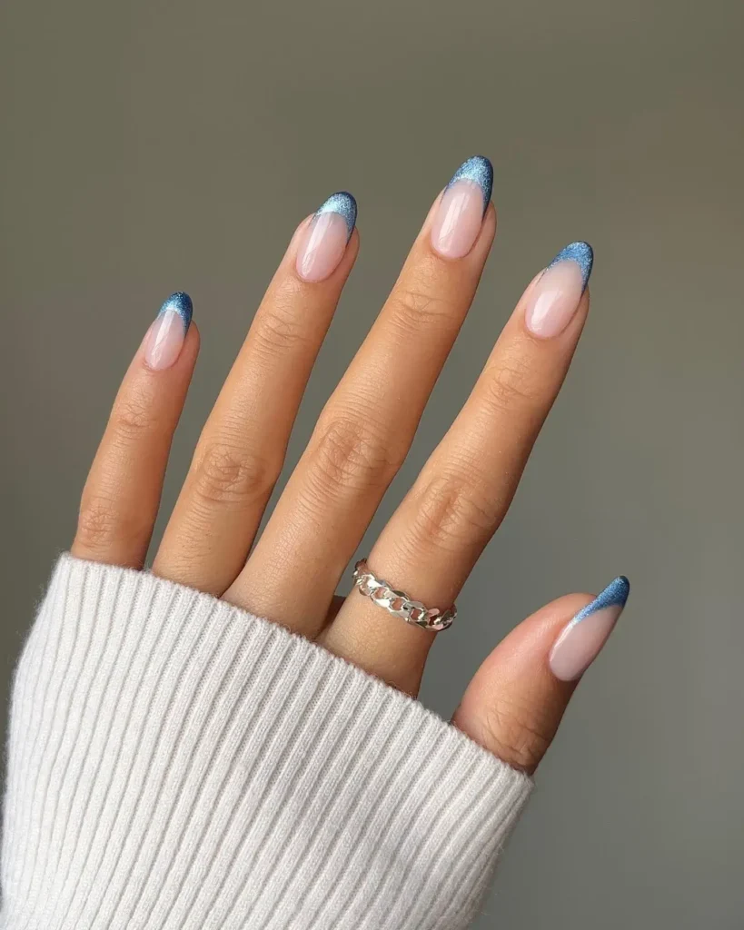 blue shimmery french tips are so magical