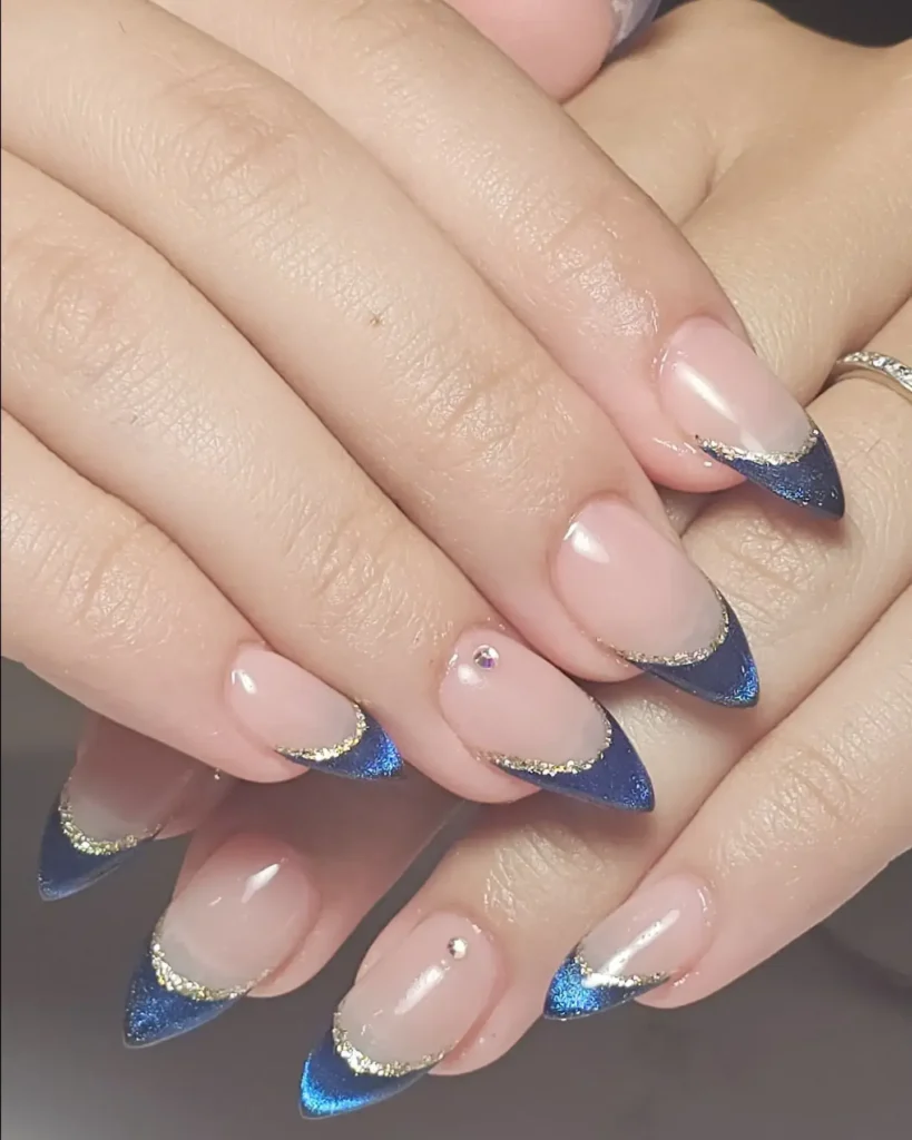 cat-eye blue finish french tip nails