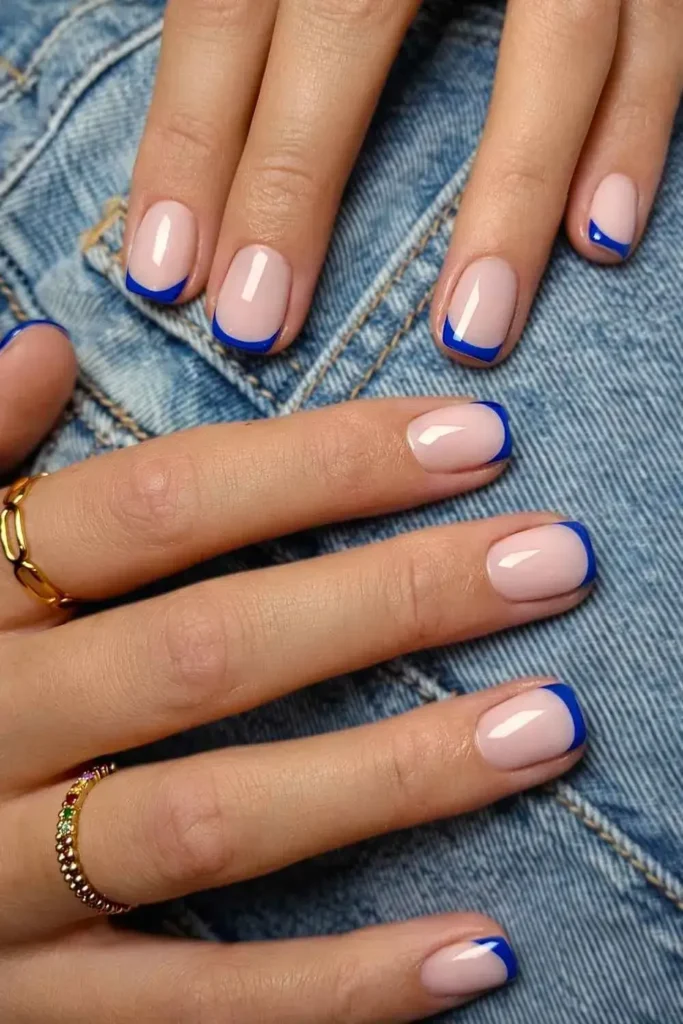 electric blue micro-tips on short french nails