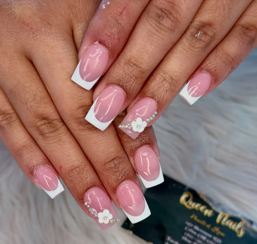 elegant french tip nails with a clear pink base and crisp white tips