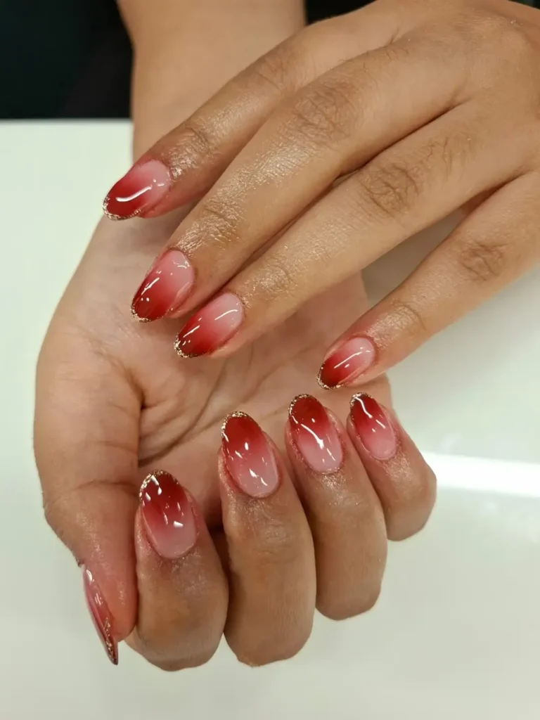 glitter ombré red french tip nails