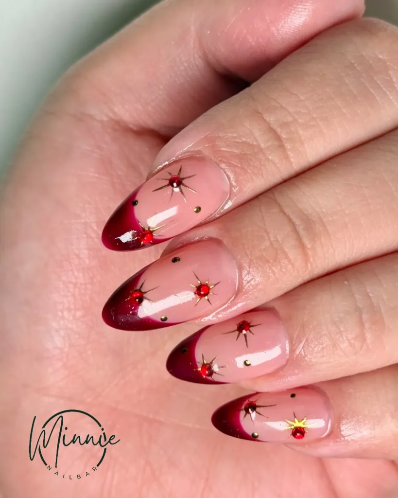 gold starburst red french tip nails
