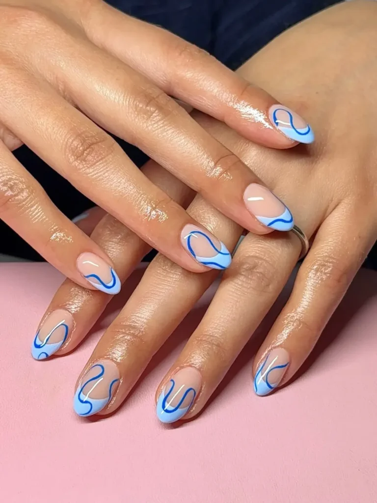 light blue abstract french tip nails