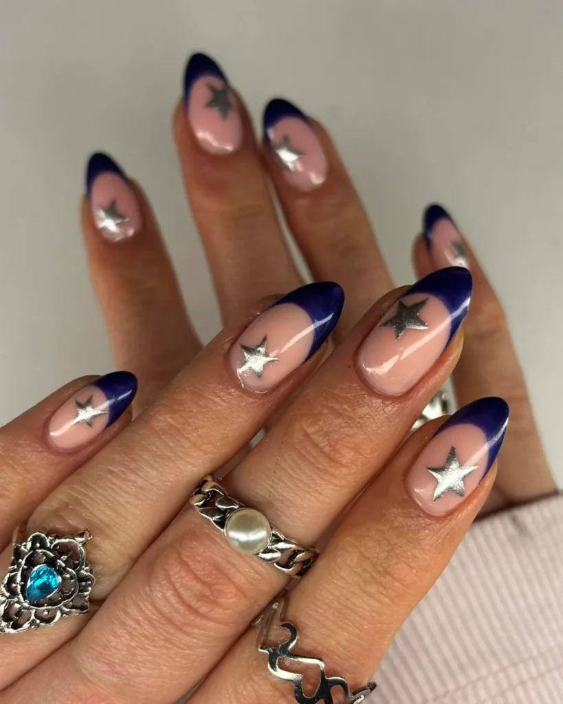 star and celestial motifs blue finish french tip nails