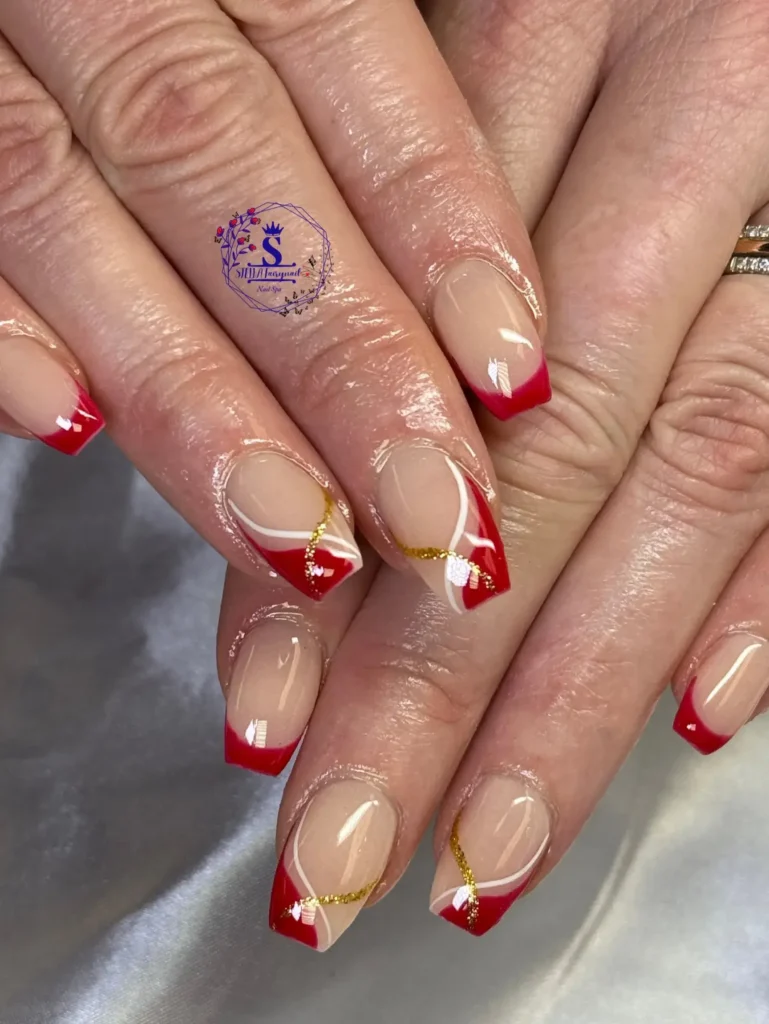 swirly shimmer red french tip nails