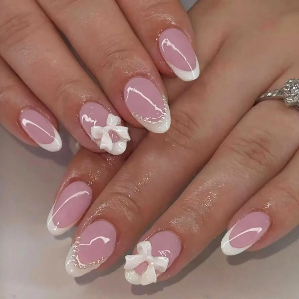 white french tip nail designs with bow and pearl