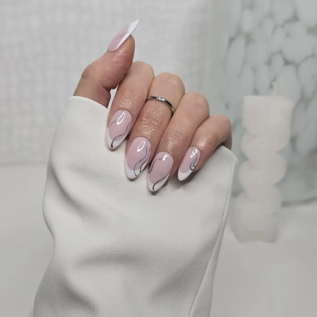 white french tip nail designs with silver swirl