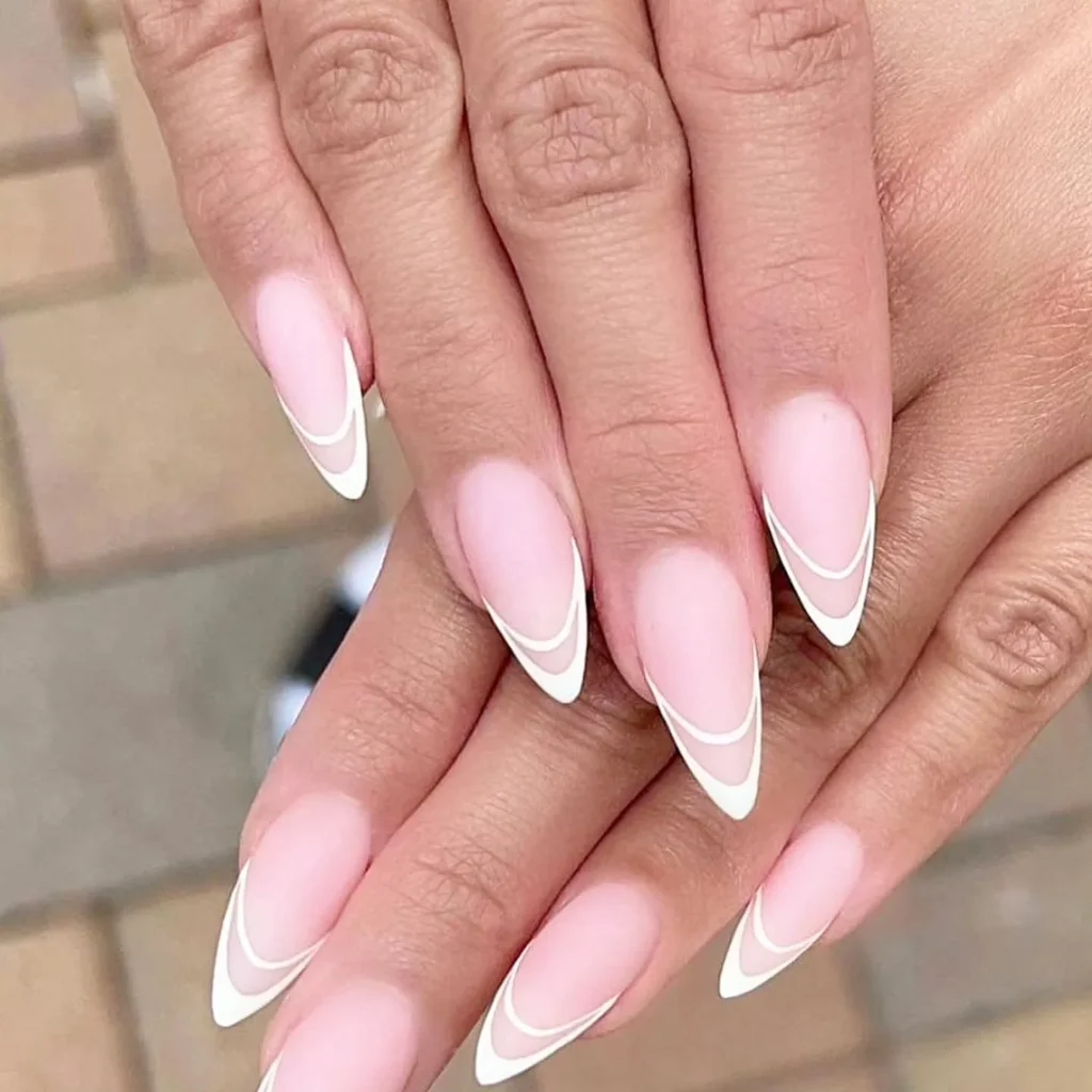 white french tip nail designs with swirly or abstract accents
