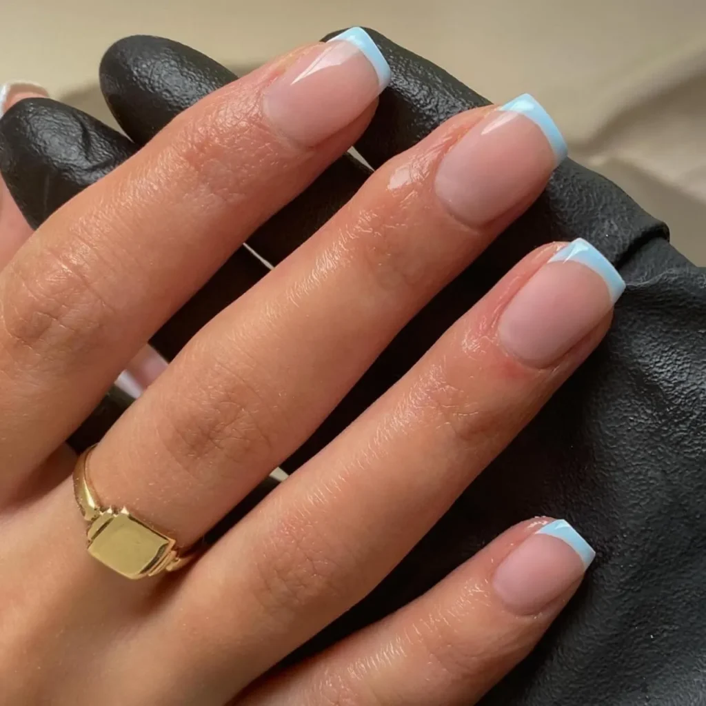 Chrome French Tip Nails 2026: 32 Designs and What to Tell Your Nail Tech 17 pale blue chrome french tips on square nails with a clear base