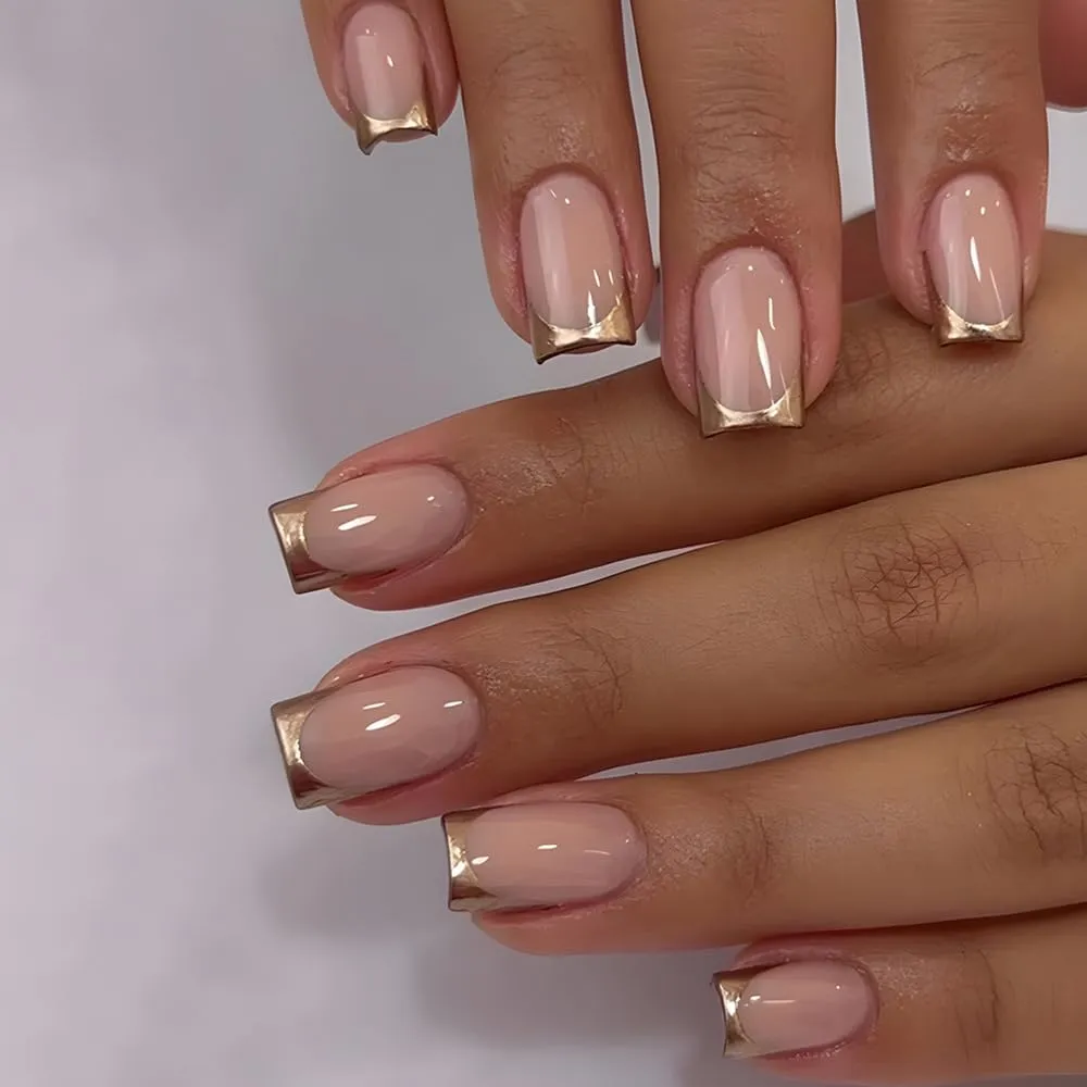 Chrome French Tip Nails 2026: 32 Designs and What to Tell Your Nail Tech 14 peach gold chrome french tips on square nails with an oat milk beige base