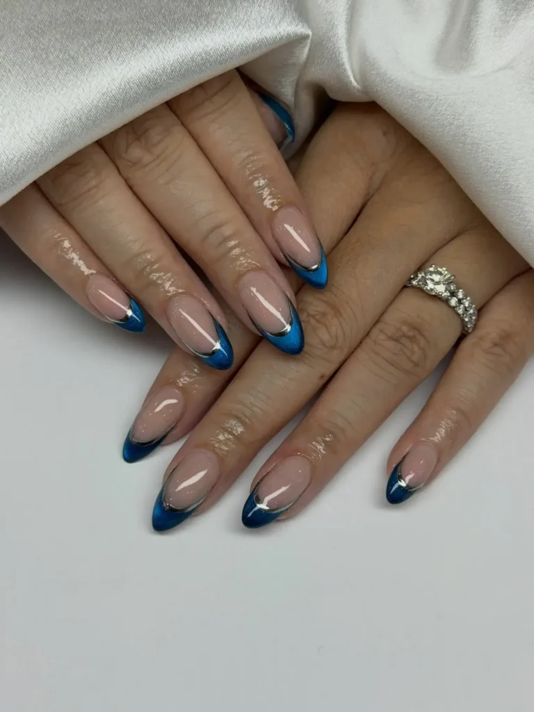 Chrome French Tip Nails 2026: 32 Designs and What to Tell Your Nail Tech 23 royal blue chrome french tips on almond nails with a milky base