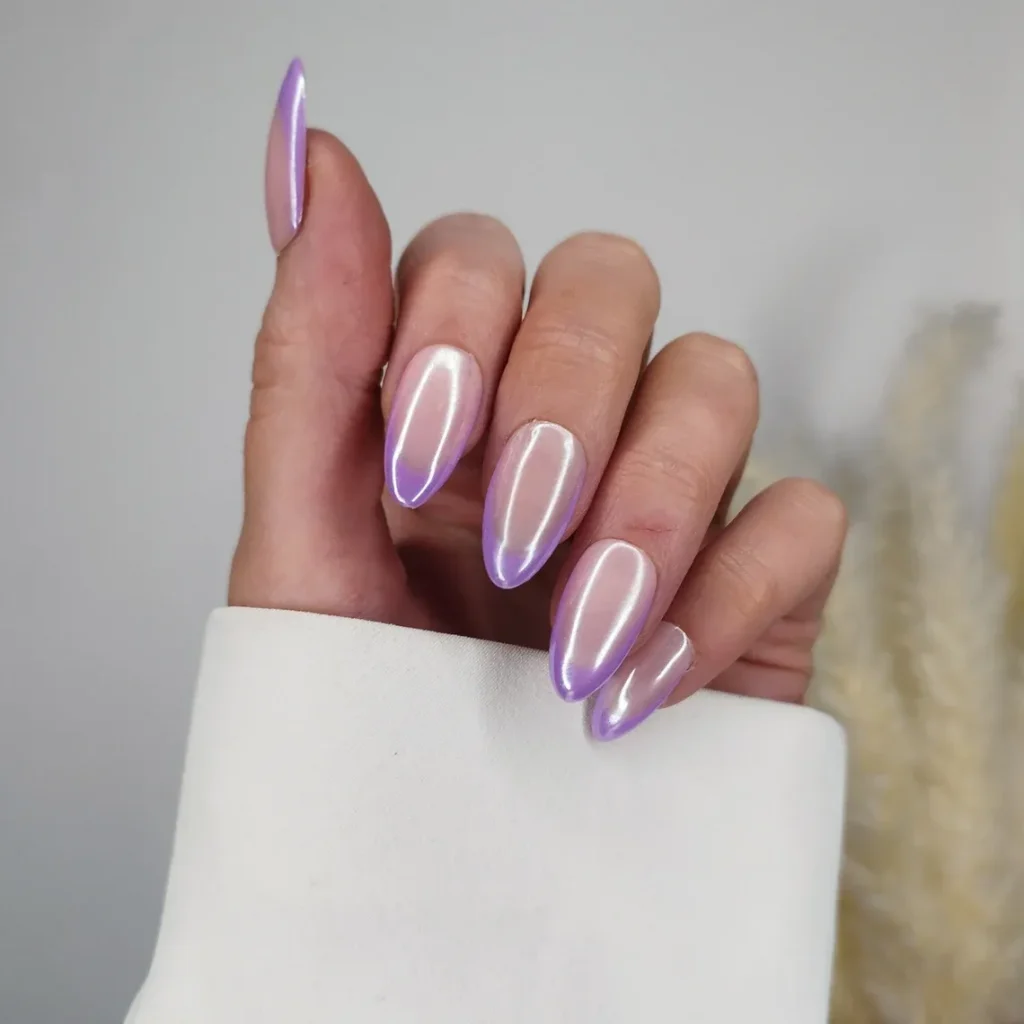 Chrome French Tip Nails 2026: 32 Designs and What to Tell Your Nail Tech 16 soft lavender chrome french tips on oval nails with a milky base